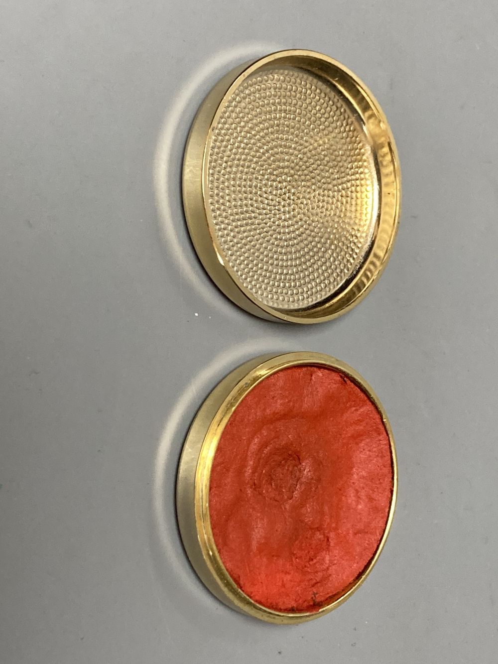 Two Japanese plates, a cloisonne vase and a seal paste box, largest 24.5cm